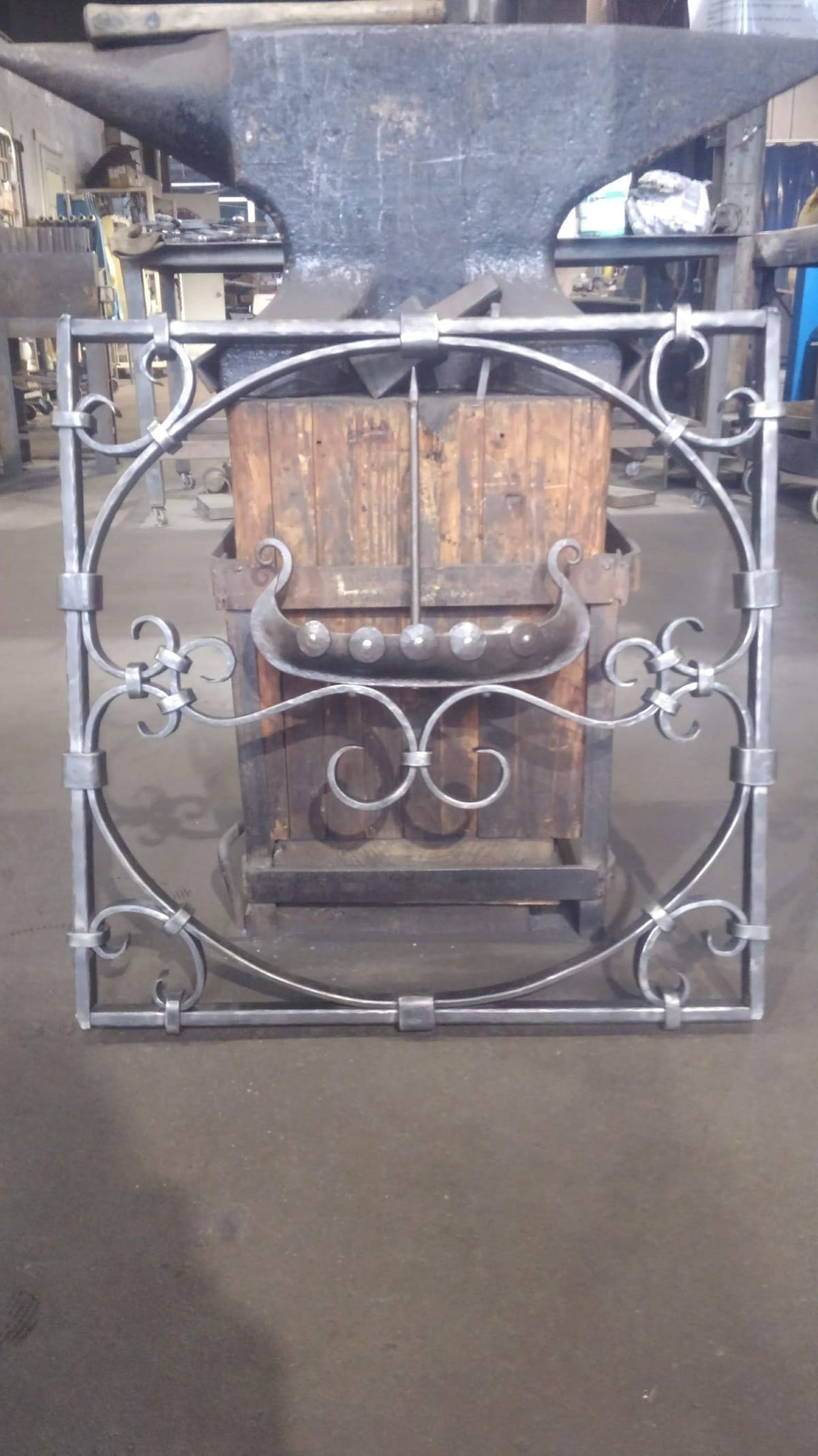 A forged gate panel with scrollwork, made in the VIB shop