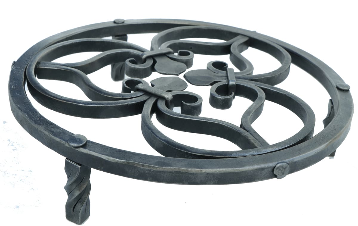 A forged scroll trivet